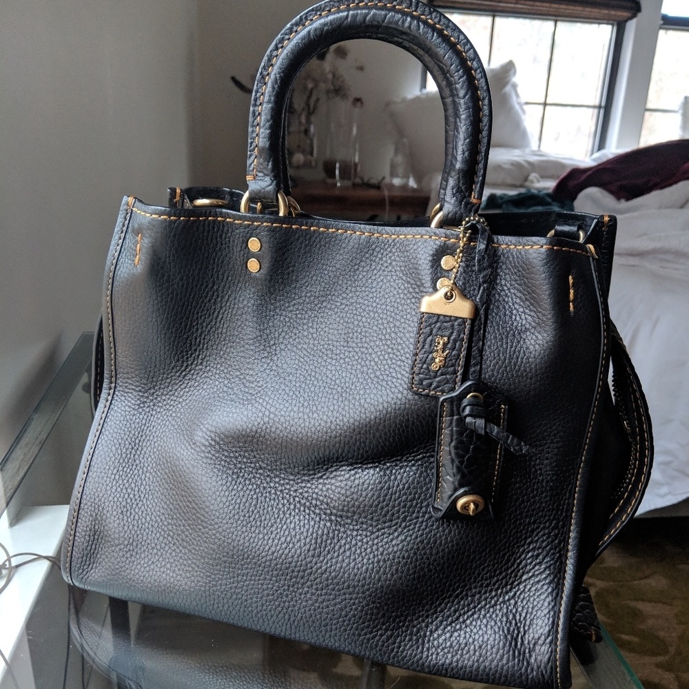 First edition rogue with lock and black lining.